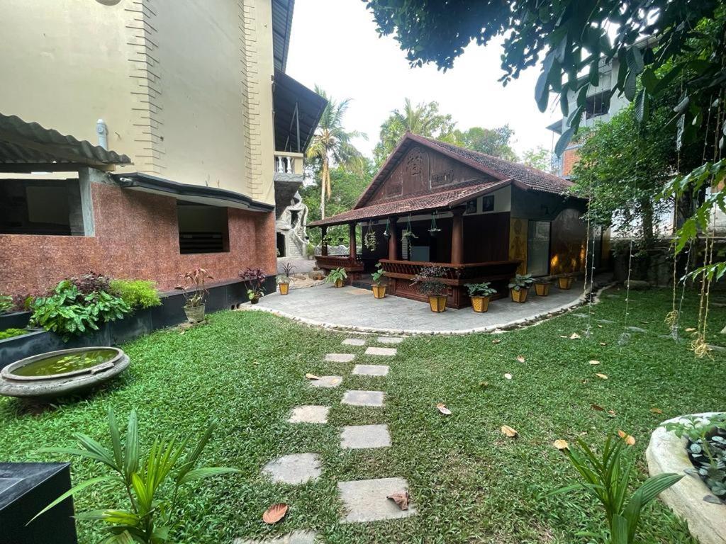 Hotel Kalpadiyil à Balarampuram Extérieur photo